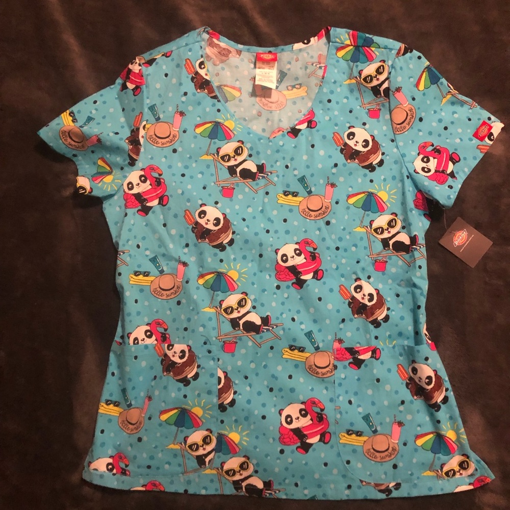 Scrub top , brand new never worn and still has the tags on.